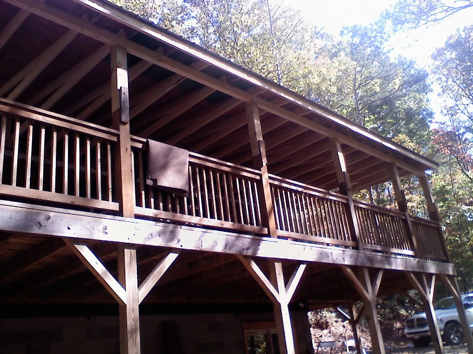 Timber framing under a new elevated porch and deck — Roof Leak Repair in Waxahachie by Roofing Brothers